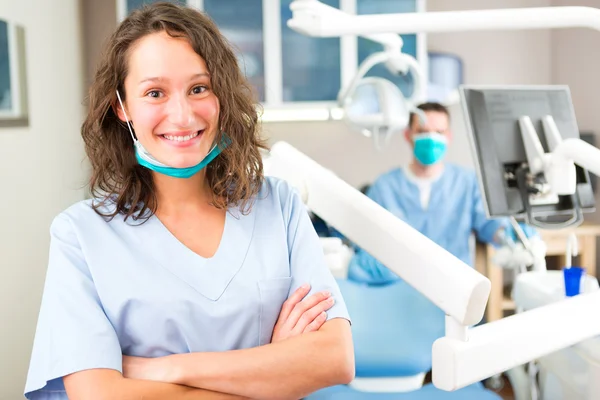 Portrait of a young attractive dentist in his office — Stock Photo, Image