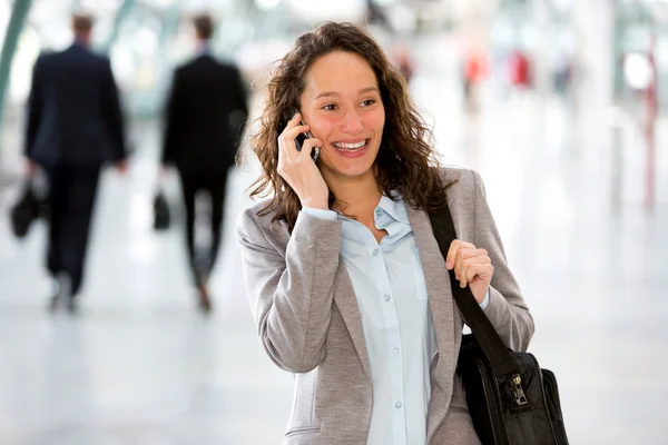 Young attractive business woman using smartphone — Stock Photo, Image