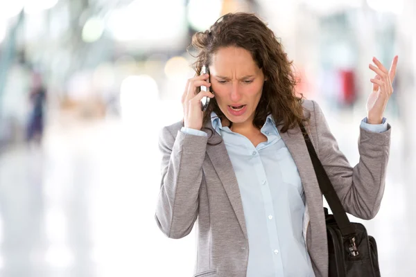 Young attractive business woman using smartphone — Stock Photo, Image