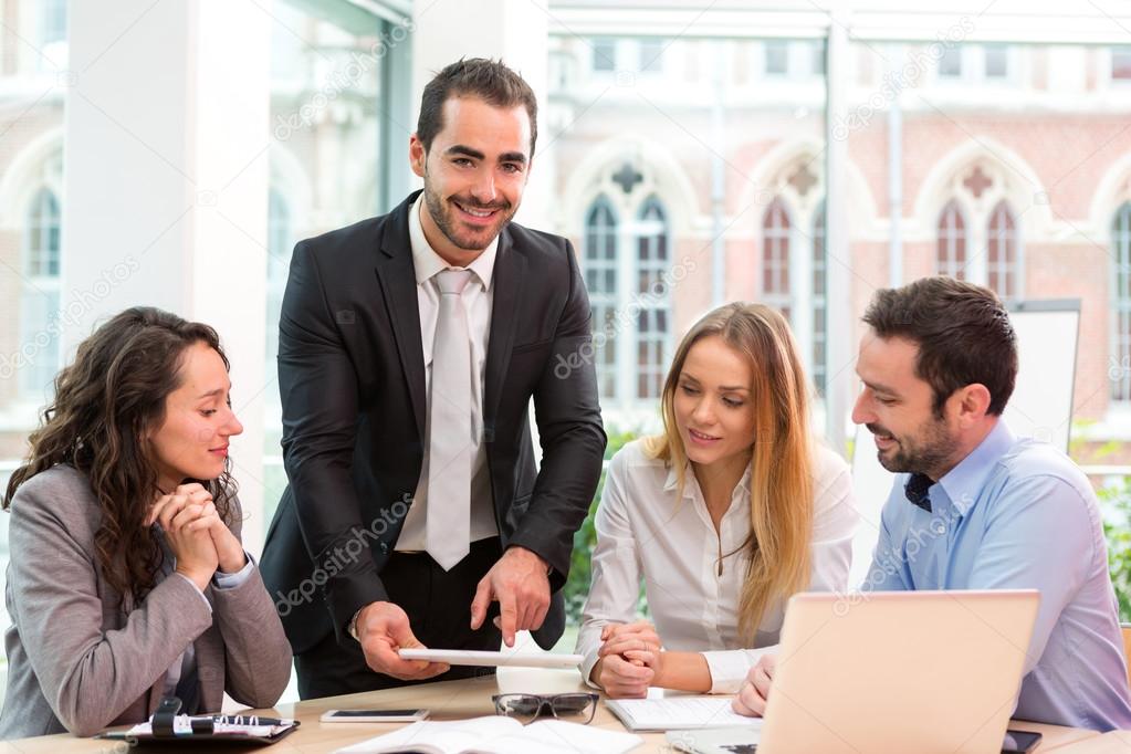 Group of business people working together at the office