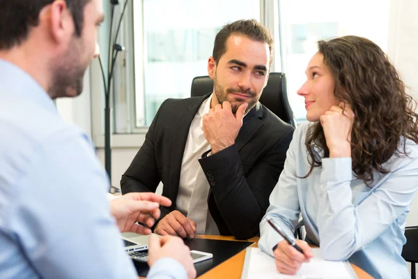 Attractive boss doing interview with his assistant — Stock Photo, Image