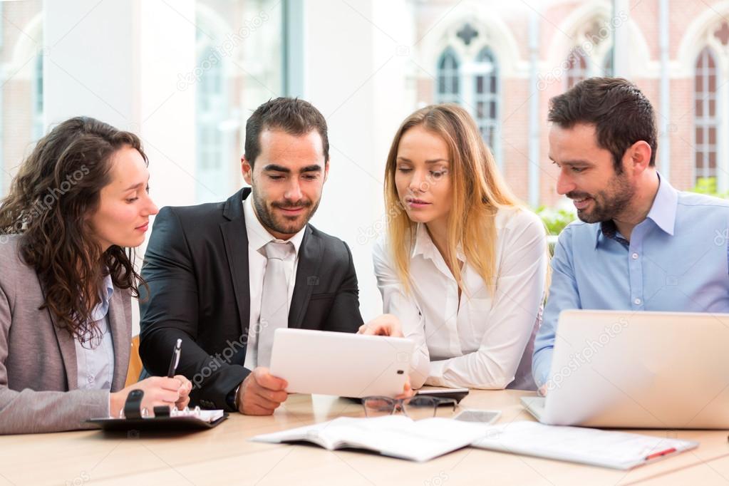 Group of business people working together at the office