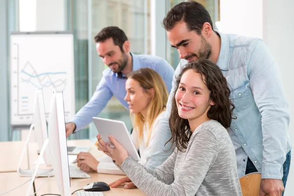 Young attractive people taking a training course with formator — Stock Photo, Image