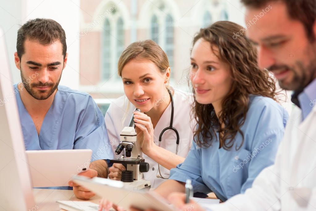 Medical team working at the hospital all together