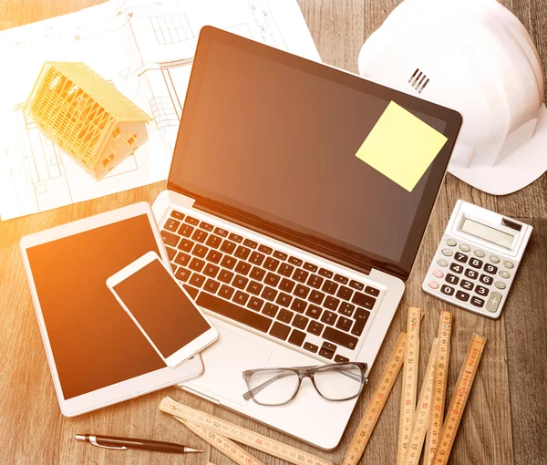 Wood architect's desk in high definition with laptop, tablet and — Stock Photo, Image