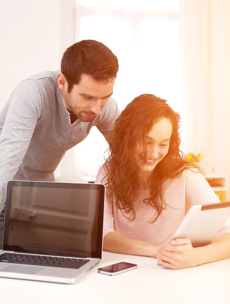 Man working with his co-worker on computer — Stock Photo, Image