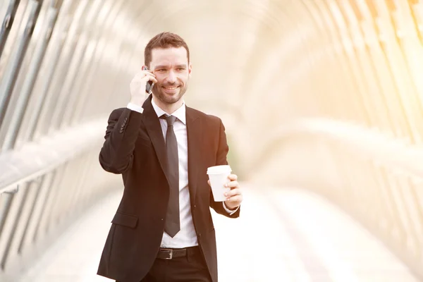 Young attractive business man in business district — Stock Photo, Image