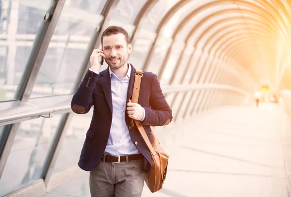 Young attractive business man in business district — Stock Photo, Image