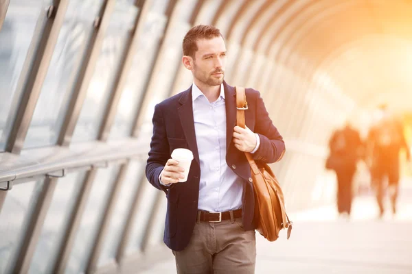 Young attractive business man in business district — Stock Photo, Image