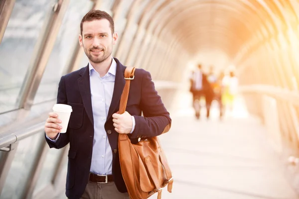 Young attractive business man in business district — Stock Photo, Image