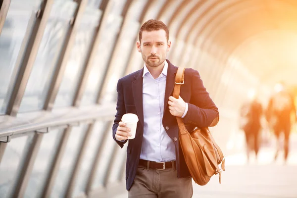 Young attractive business man in business district — Stock Photo, Image
