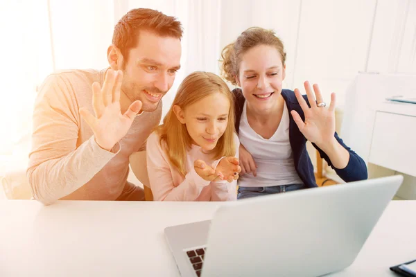 Family having a videocall on a laptop — Stock Photo, Image
