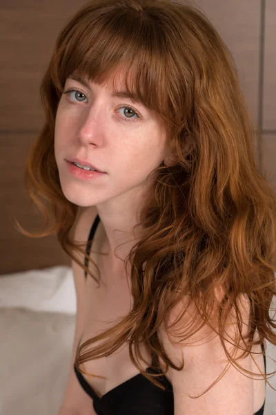 Redhead in black — Stock Photo, Image