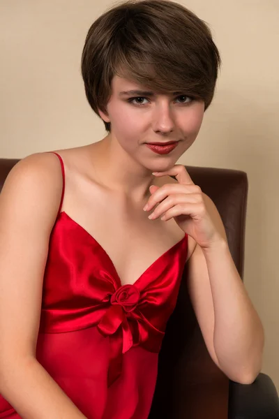 Brunette in red — Stock Photo, Image