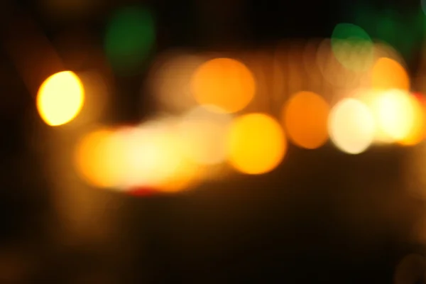 抽象的城市灯光模糊闪烁背景。软焦点. — 图库照片
