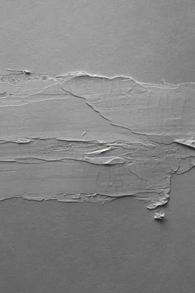 Trazo de cepillo en la pared vacía gris — Foto de Stock