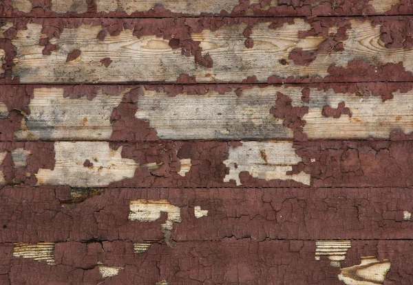 Pranchas de madeira marrom claro com pintura peeling, textura — Fotografia de Stock