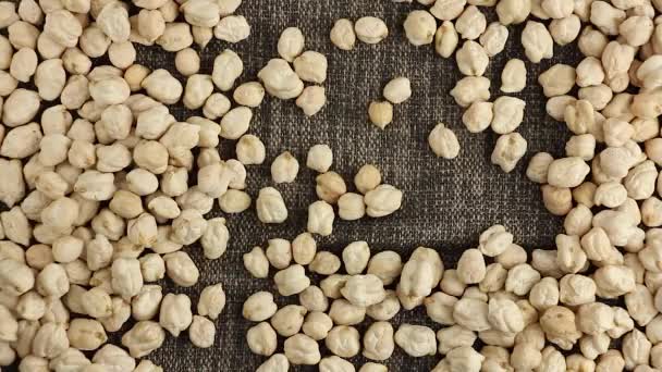 Palm Hands Scatters Dried Chickpeas Seeds Brown Cloth Top View — Stock Video