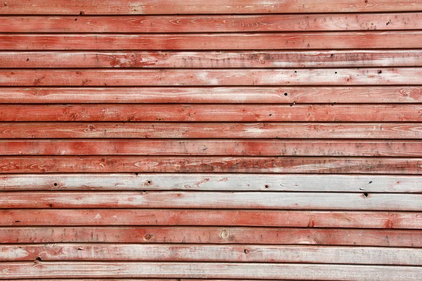 Horizontale Holzdielen mit abblätternder roter Farbe, Textur — Stockfoto