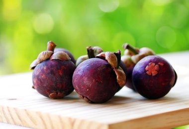 Mangosteen fruit on table