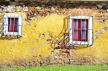 two windows in facade of poruguese house clipart