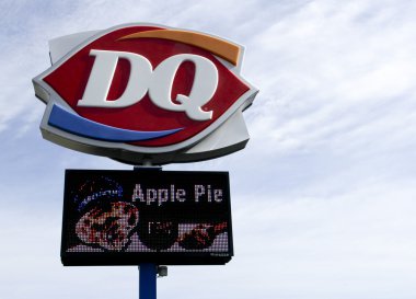 Dairy Queen Sign on a post outdoors clipart