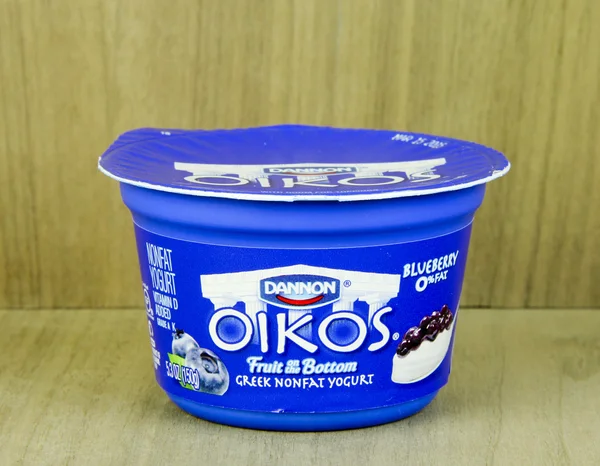 Container of Dannon Oikos Blueberry Yogurt — Stock Photo, Image