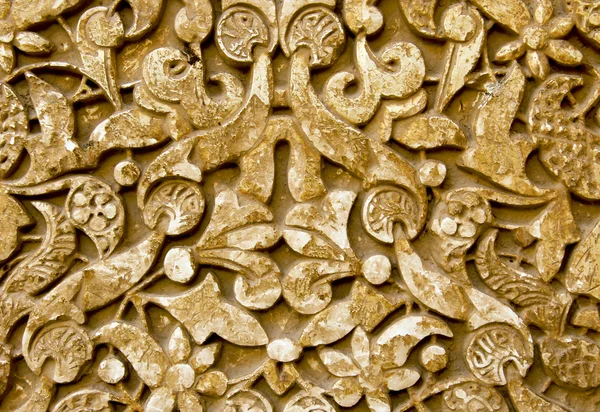 Antiguo muro de piedra tallado del Palacio de la Alhambra de Granada España — Foto de Stock