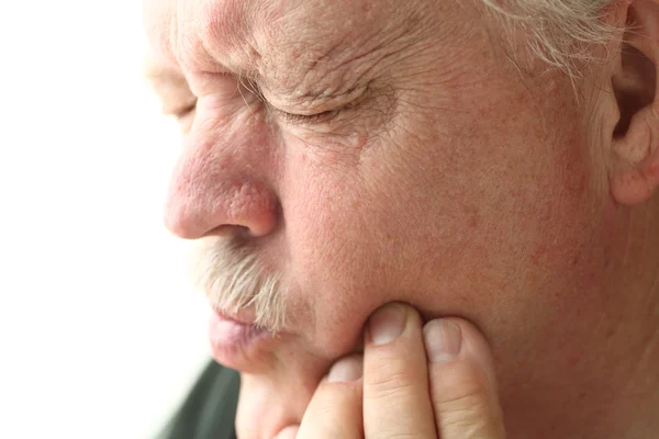 Senior man met tand pijn — Stockfoto