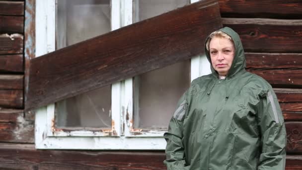 Woman in waterproof raincoat — Stock Video