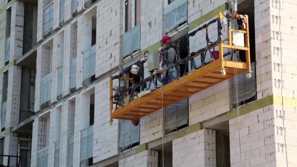 Builder in red hard hat — Stock Video