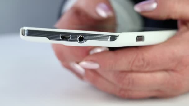 Closeup of woman hands with cell phone — Stock Video