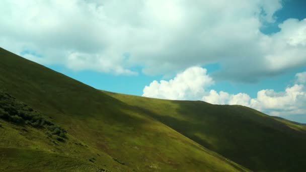 Timelapse of clouds and beautiful green mountains — Stock Video