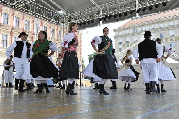 Members of folk groups from Sveta Marija, Croatia during the 48th International Folklore Festival in center of Zagreb — Stock Photo, Image