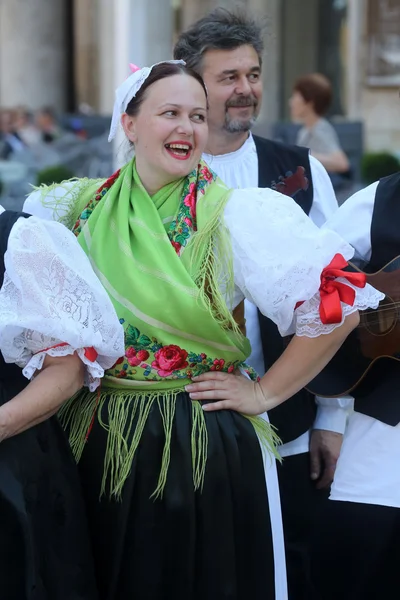 Members of folk groups from Mihovljan, Croatia during the 48th International Folklore Festival in Zagreb — Stock Photo, Image