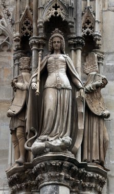 Statue of saint at St Stephen's Cathedral in Vienna clipart