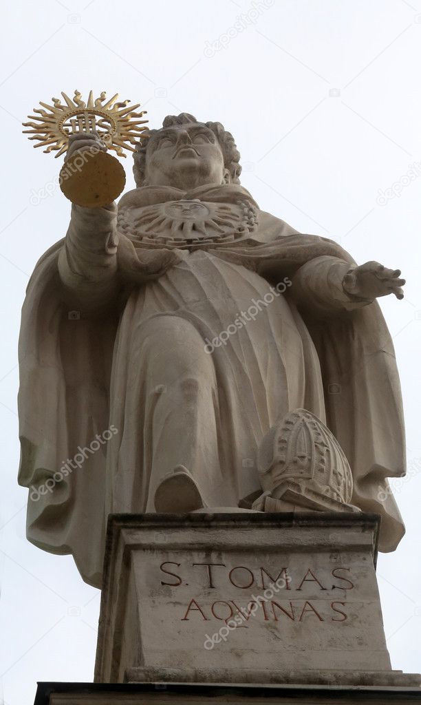 Saint Thomas Aquinas statueon the facade of Dominican Church in Vienna, Austria 