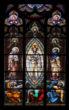 Transfiguration on Mount Tabor, Stained glass in Votiv Kirche (The Votive Church). It is a neo-Gothic church in Vienna clipart