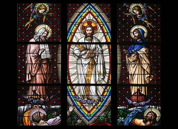 Transfiguration on Mount Tabor, Stained glass in Votiv Kirche (The Votive Church). It is a neo-Gothic church in Vienna — Stock Photo, Image