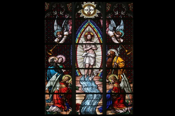 Baptism of the Christ, Stained glass in Votiv Kirche (The Votive Church). It is a neo-Gothic church in Vienna — Stock Photo, Image