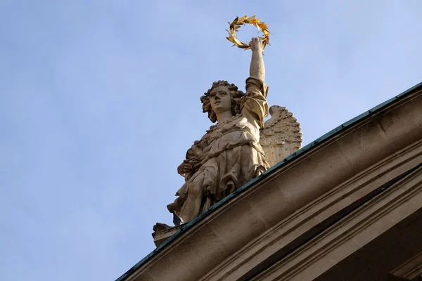 Angel on the portal of St. Catherine church and Mausoleum of Ferdinand II, Graz, Austria — Stock Photo, Image