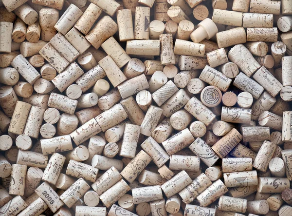 Used wine bottle corks on display in the window of a wine shop, Graz, Austria — Stock Photo, Image