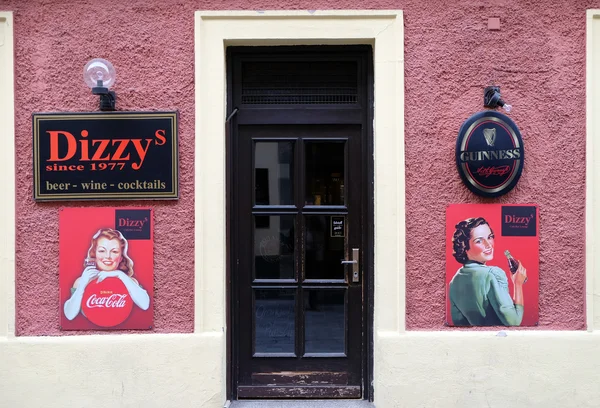 Dizzy bar and advertisement for Coca Cola in Graz, Austria — Stock Photo, Image