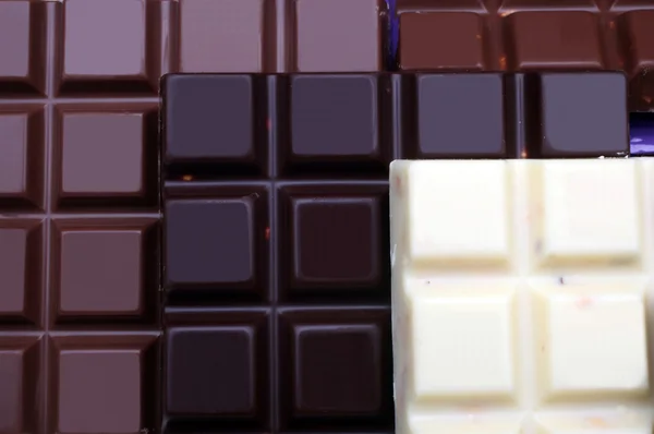 Different chocolate pieces — Stock Photo, Image