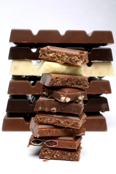 Verschillende chocoladestukjes — Stockfoto