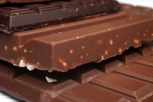 Verschillende chocoladestukjes — Stockfoto