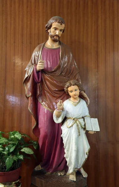 Saint joseph med barnet jesus — Stockfoto