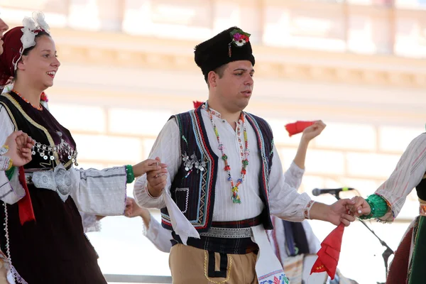 Ζάγκρεμπ, Κροατία - 17 Ιουλίου: Μέλη της Λαϊκής ομάδας ΚΙΤΚΑ από Istibanja, Μακεδονία κατά τη διάρκεια της 49ης Διεθνές Φολκλορικό Φεστιβάλ στο κέντρο του Ζάγκρεμπ, Κροατία στις 17 Ιουλίου 2015 — Φωτογραφία Αρχείου