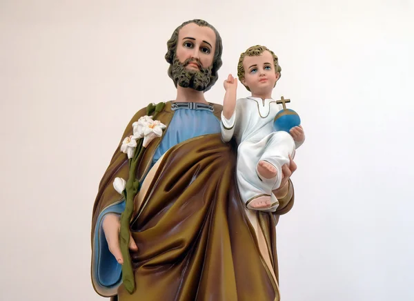 San Giuseppe con in braccio Gesù Bambino — Foto Stock