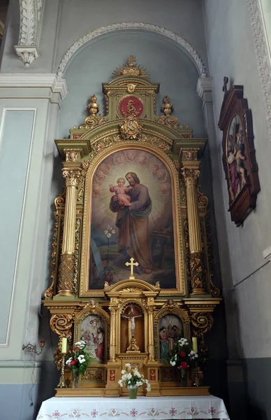 Saint Joseph holding child Jesus — Stock Photo, Image